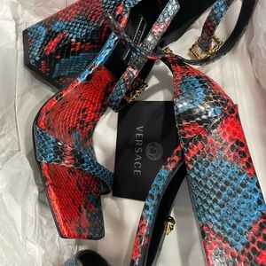 Versace block heels , brand new , never worn, just tried them a few times.